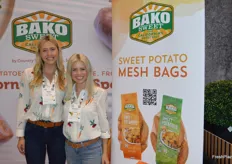 Bailey Slayton and Alexandra Rae Molumby with Bako Sweet proudly stand next to the new sweet potato mesh bags. The produce theme continues in their clothing.